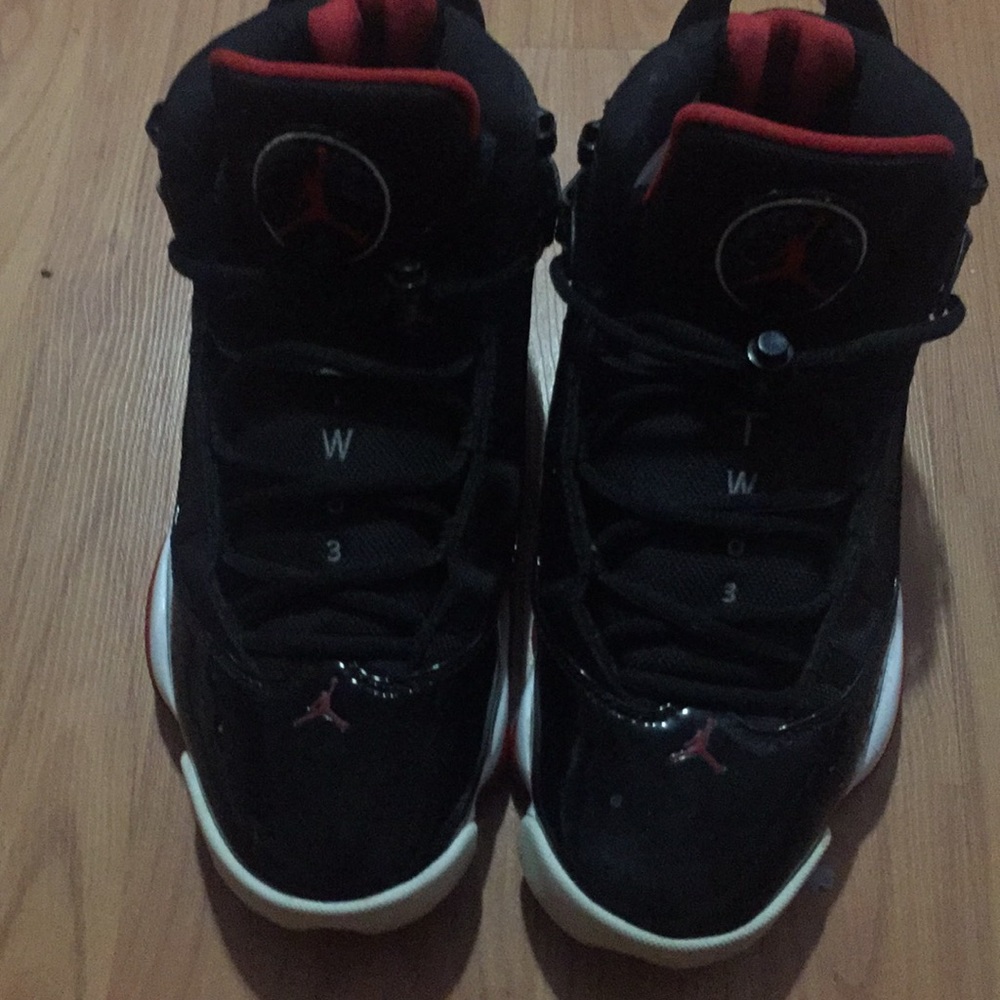 Black red and white Jordan’s